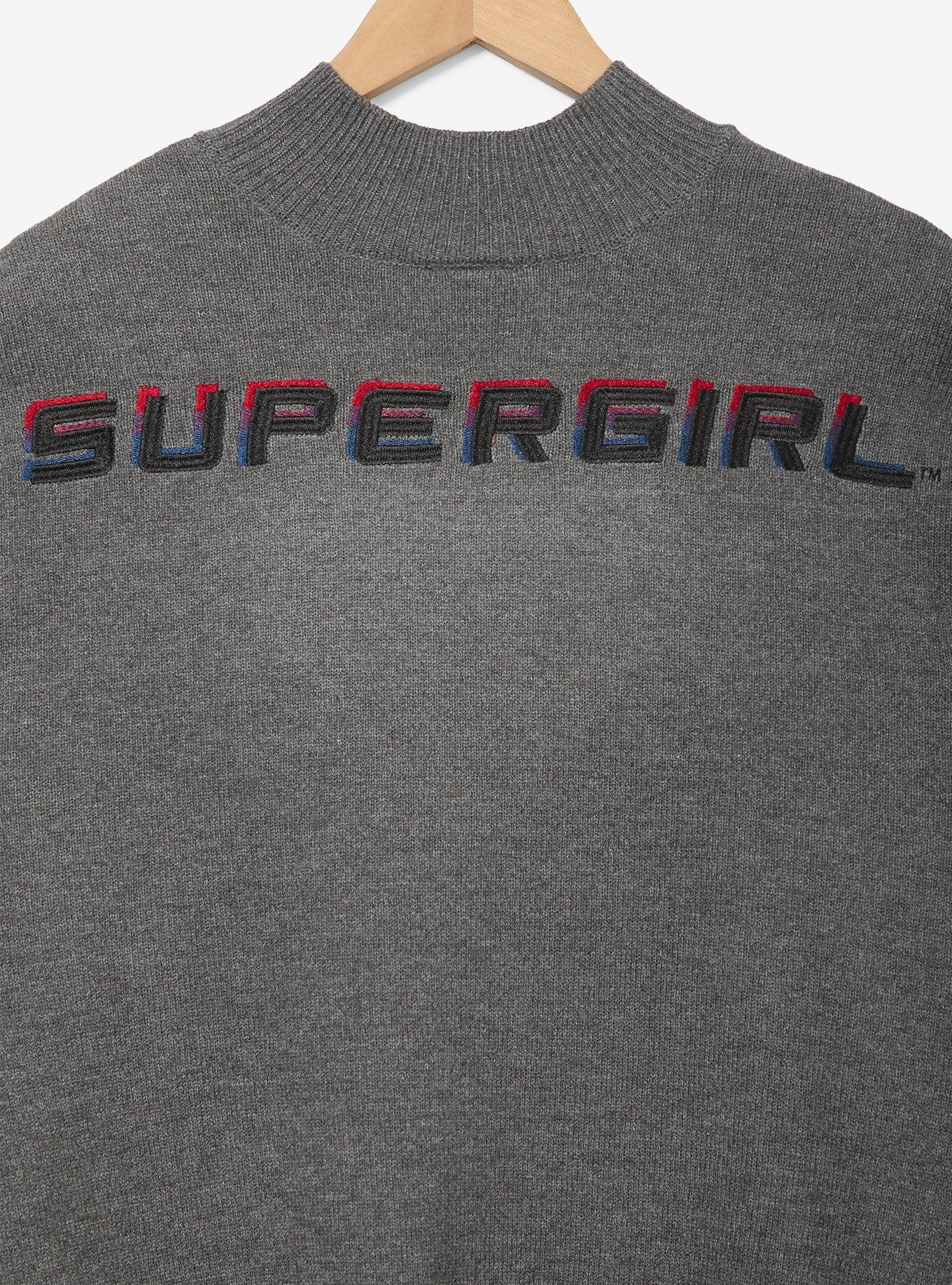 Polerón Supergirl con logo degradado y mangas bishop