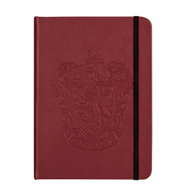 Cuaderno con emblema de Gryffindor en relieve