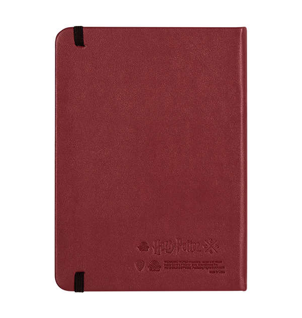 Cuaderno con emblema de Gryffindor en relieve
