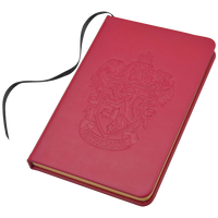 Cuaderno con emblema de Gryffindor en relieve