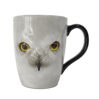 Taza con diseño del rostro de Hedwig
