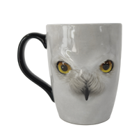 Taza con diseño del rostro de Hedwig