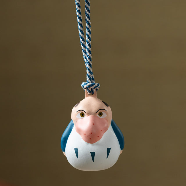 El niño y la garza: Campana Netsuke de el Hombre Garza