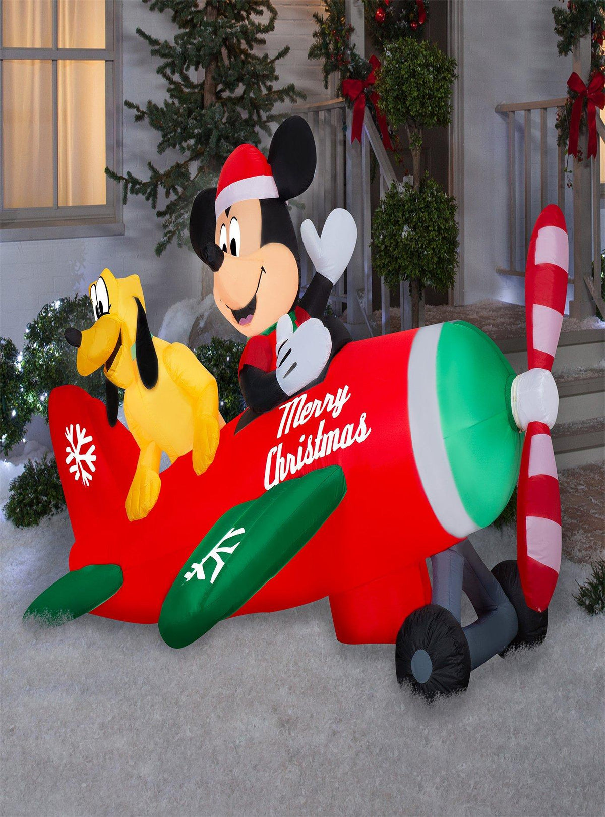 Inflable navideño LED de Mickey Mouse y Pluto en avión