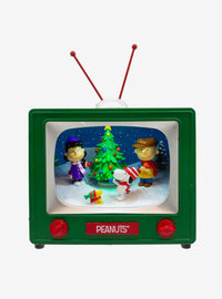 Figura musical de TV Peanuts con escena navideña