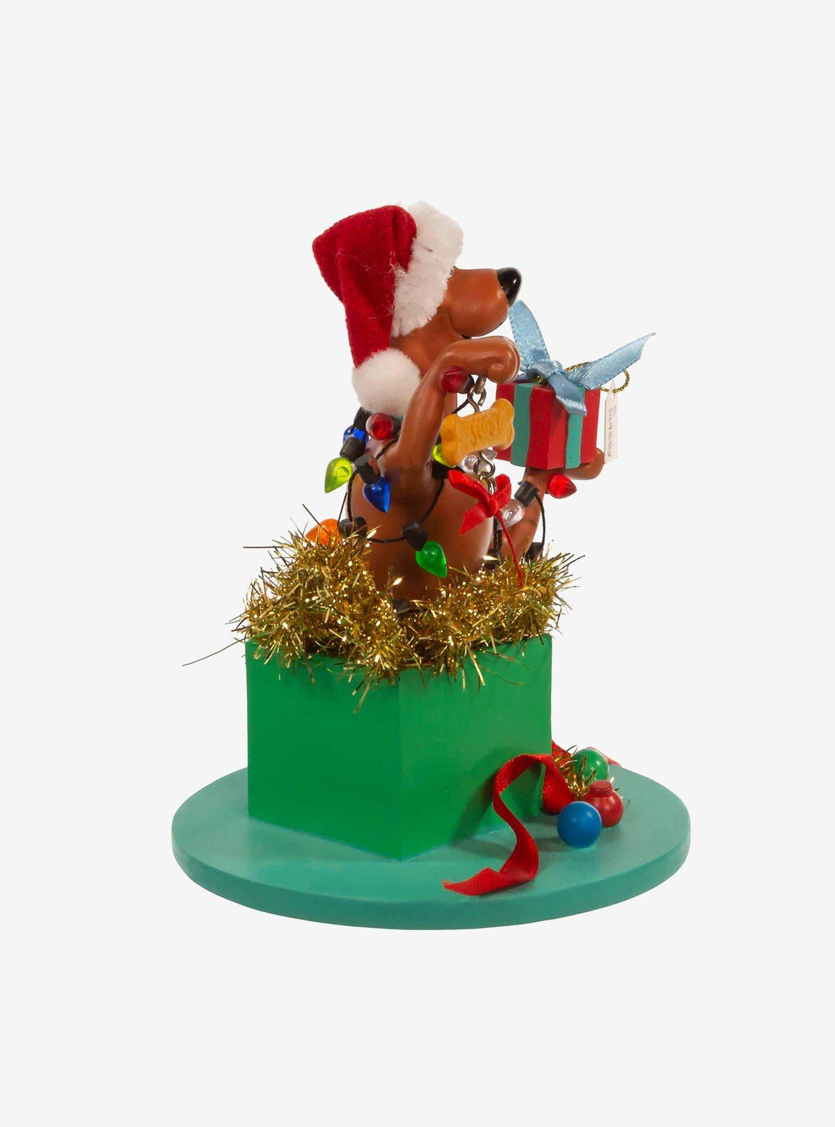 Figura de Scooby-Doo dentro de un regalo