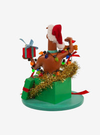 Figura de Scooby-Doo dentro de un regalo