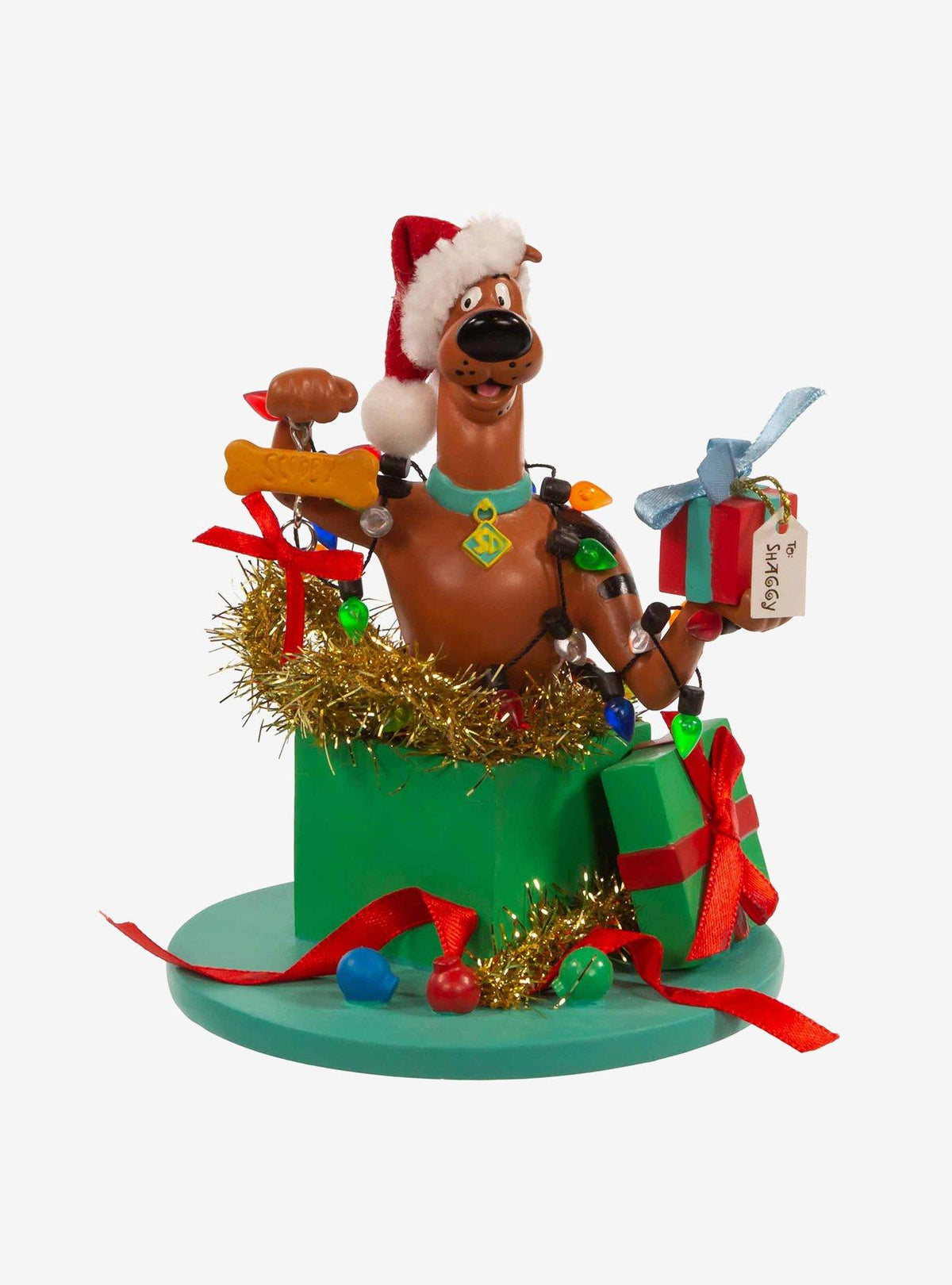 Figura de Scooby-Doo dentro de un regalo