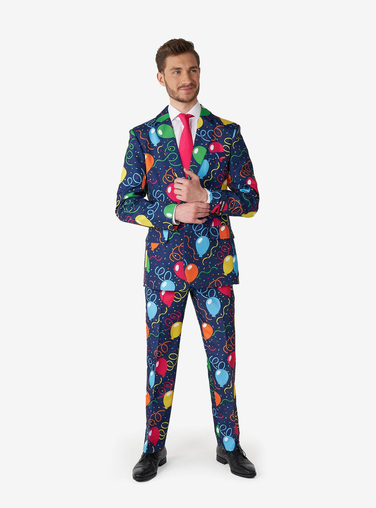 Traje azul marino con globos y confeti