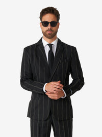 Traje negro oversize con rayas que brillan en la oscuridad