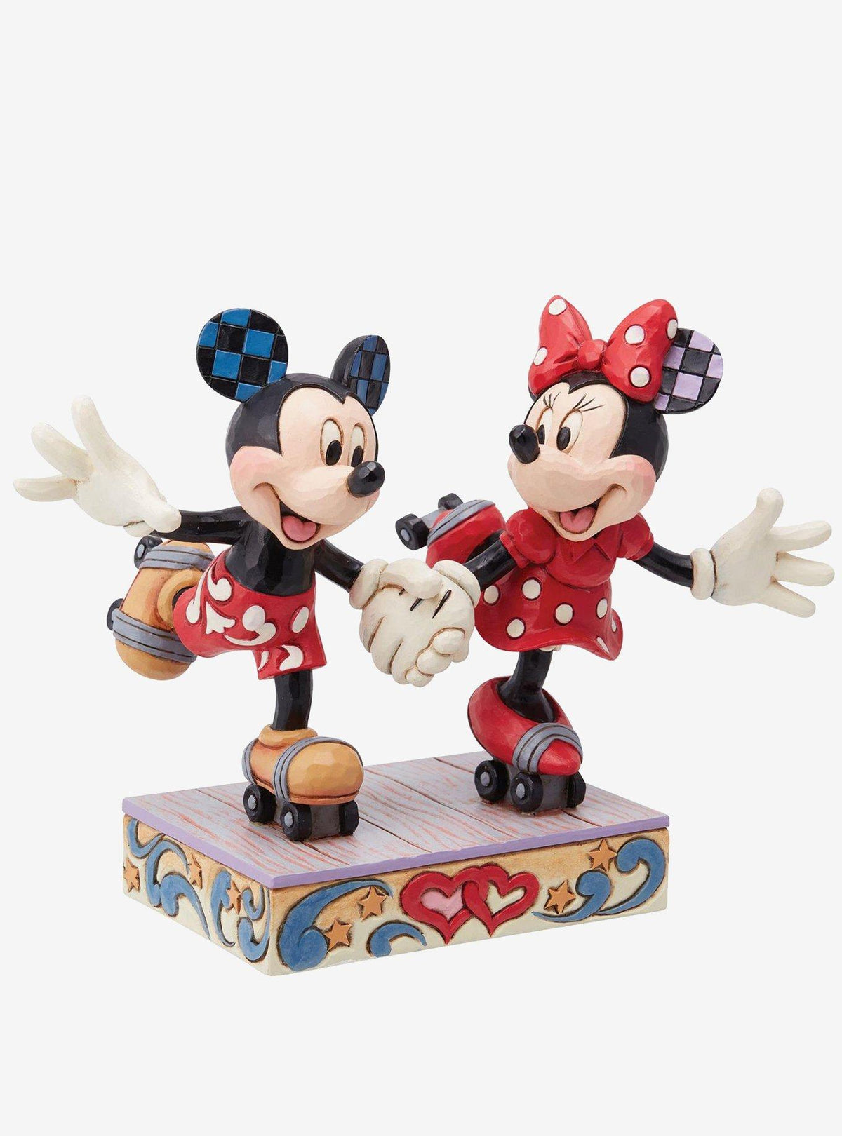 Figura de Mickey y Minnie patinando