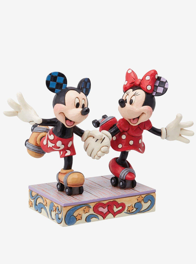 Figura de Mickey y Minnie patinando