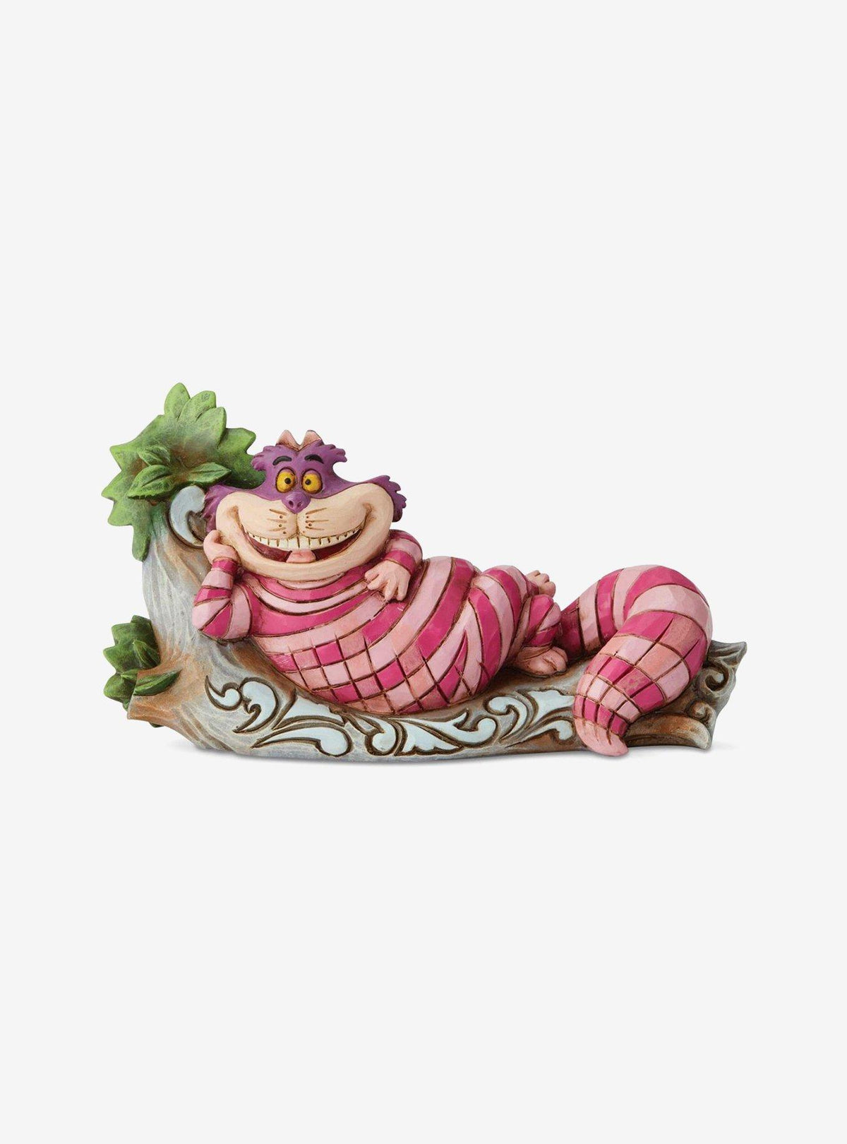 Figura de Cheshire Cat en un árbol