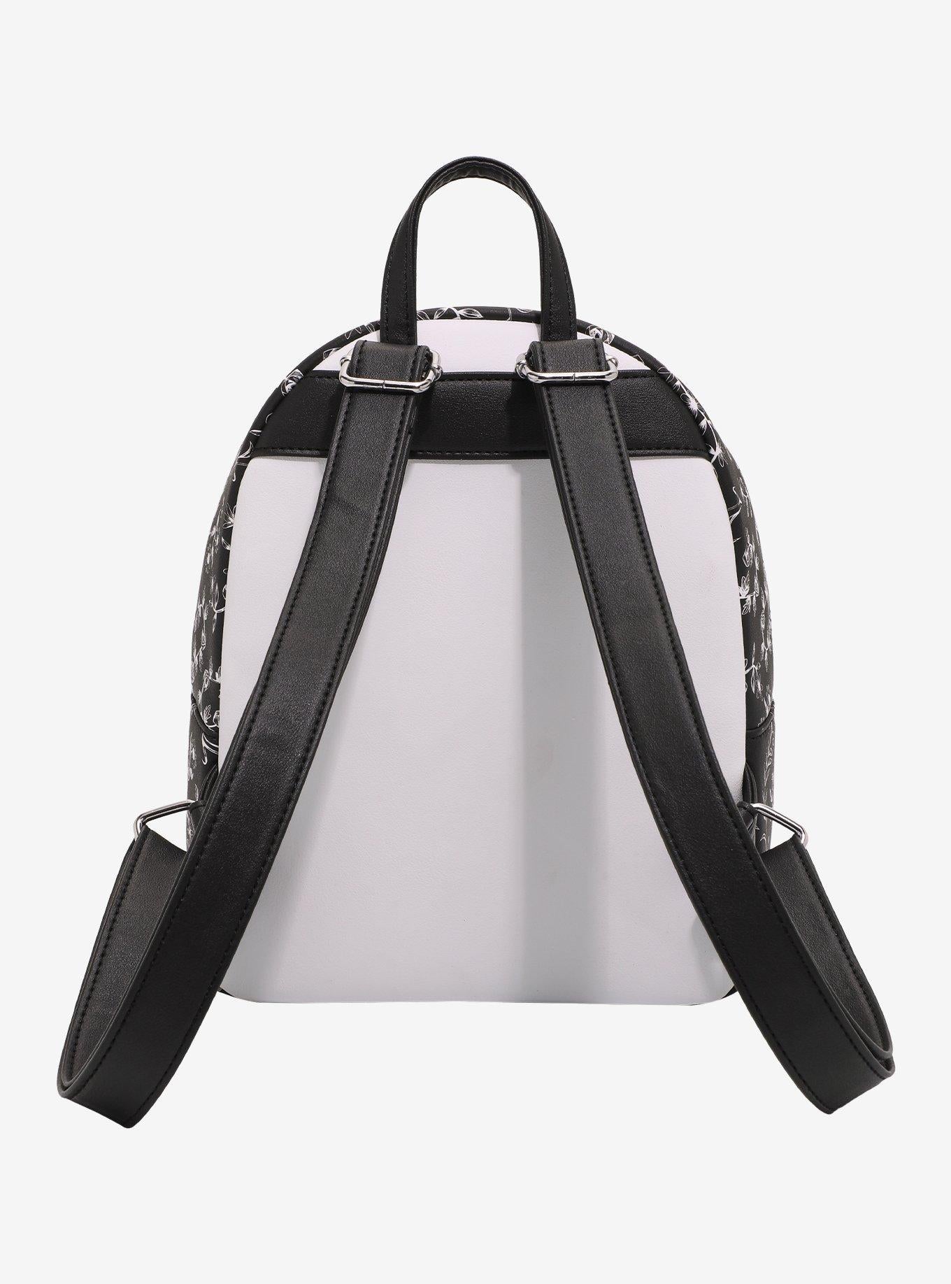 Mochila mini negra y blanca de Alice in Wonderland