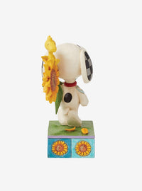 Figura Peanuts de Snoopy y Woodstock con girasol