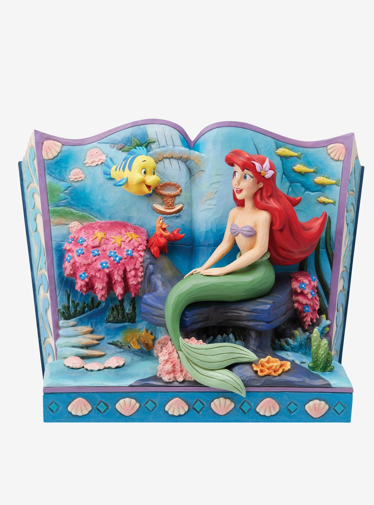 Figura de Ariel en libro de cuentos - The Little Mermaid