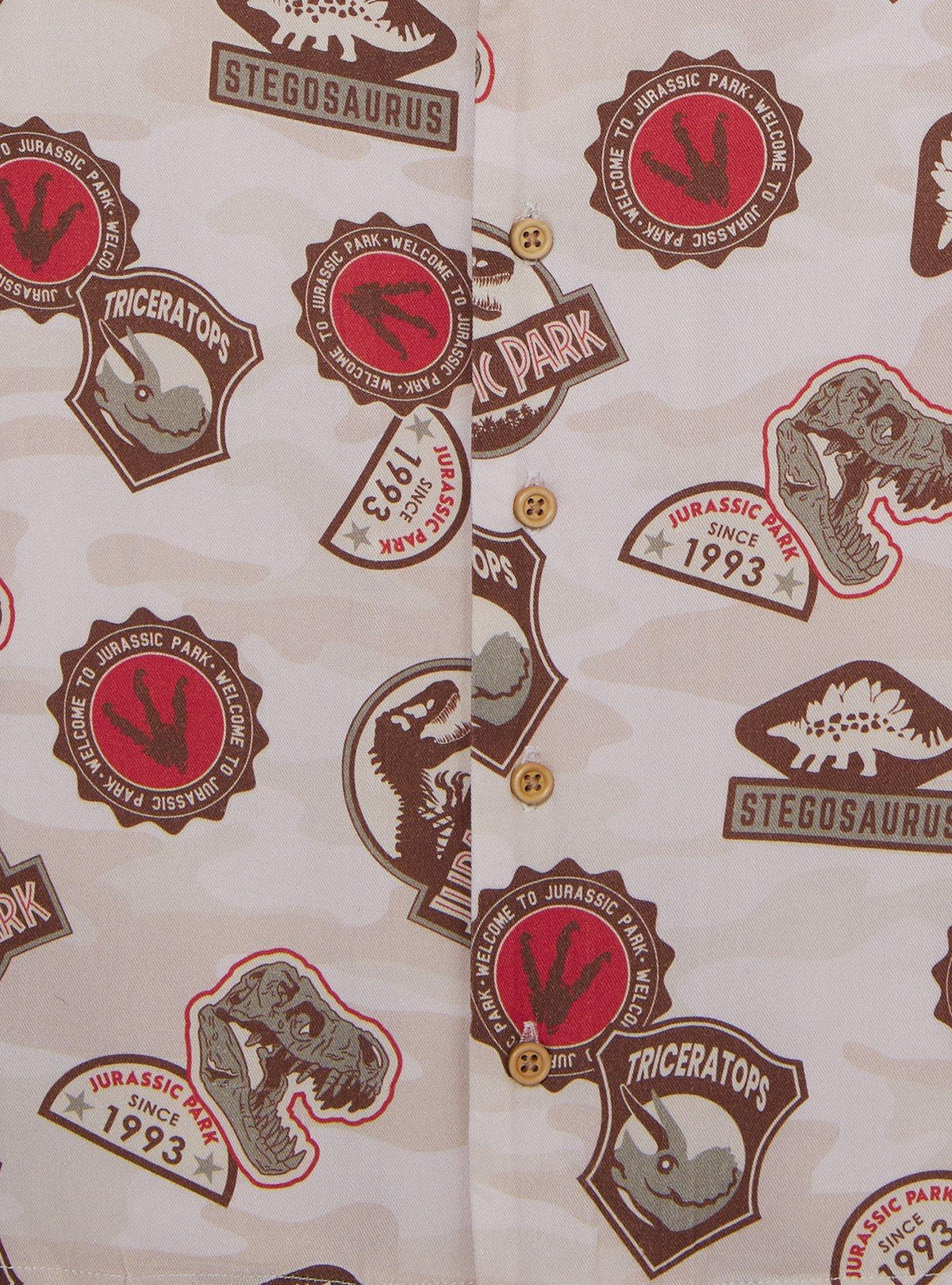 Camisa infantil Jurassic Park con estampado de insignias