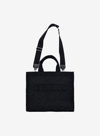 Bolso tote sherpa negro de Snoopy con correa para maleta