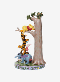 Figura de Winnie the Pooh y sus amigos en el árbol