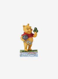 Figura de Winnie the Pooh con tréboles y caldero