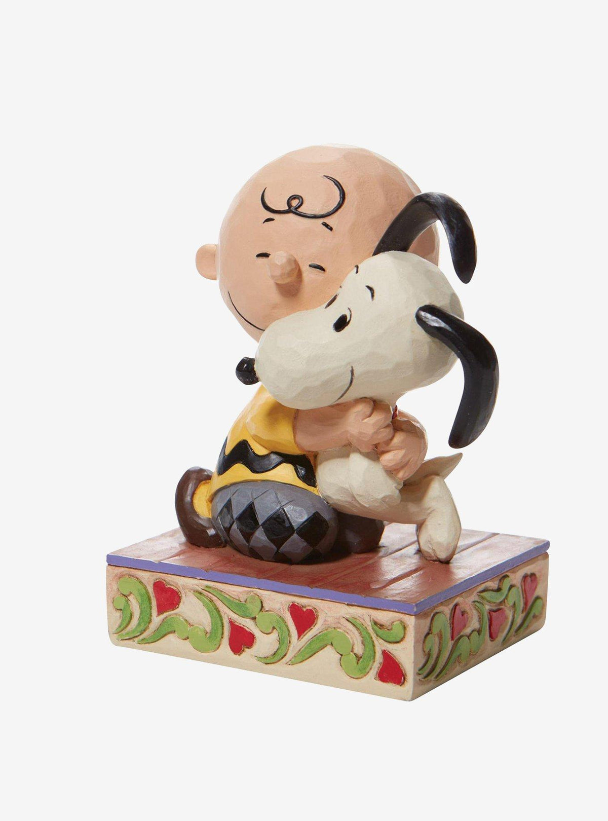 Figura de Charlie Brown y Snoopy abrazados