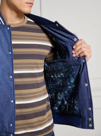 Chaqueta varsity de mezclilla Warner Bros.