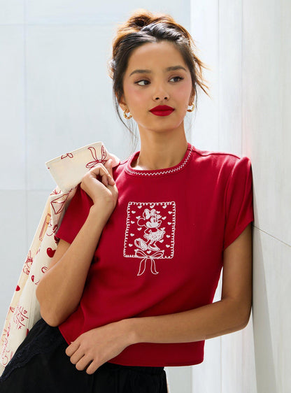 Baby tee de Minnie Mouse con corazones