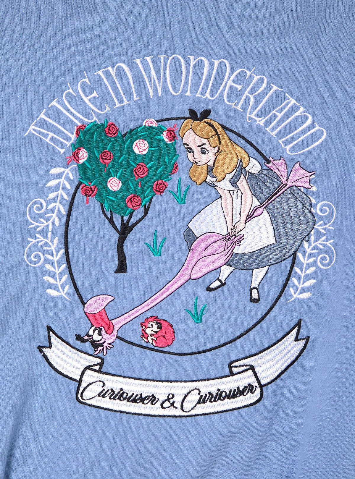 Polerón cropped con cierre Disney Alice in Wonderland