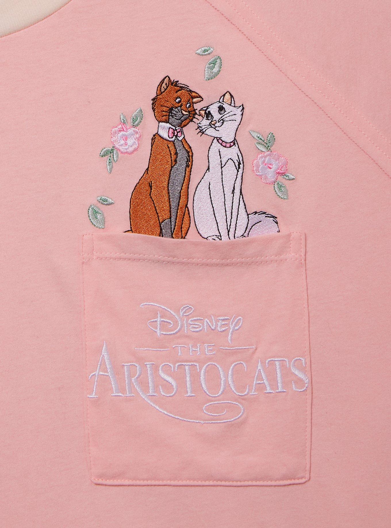 Polera rosada con bolsillo The Aristocats para mujer