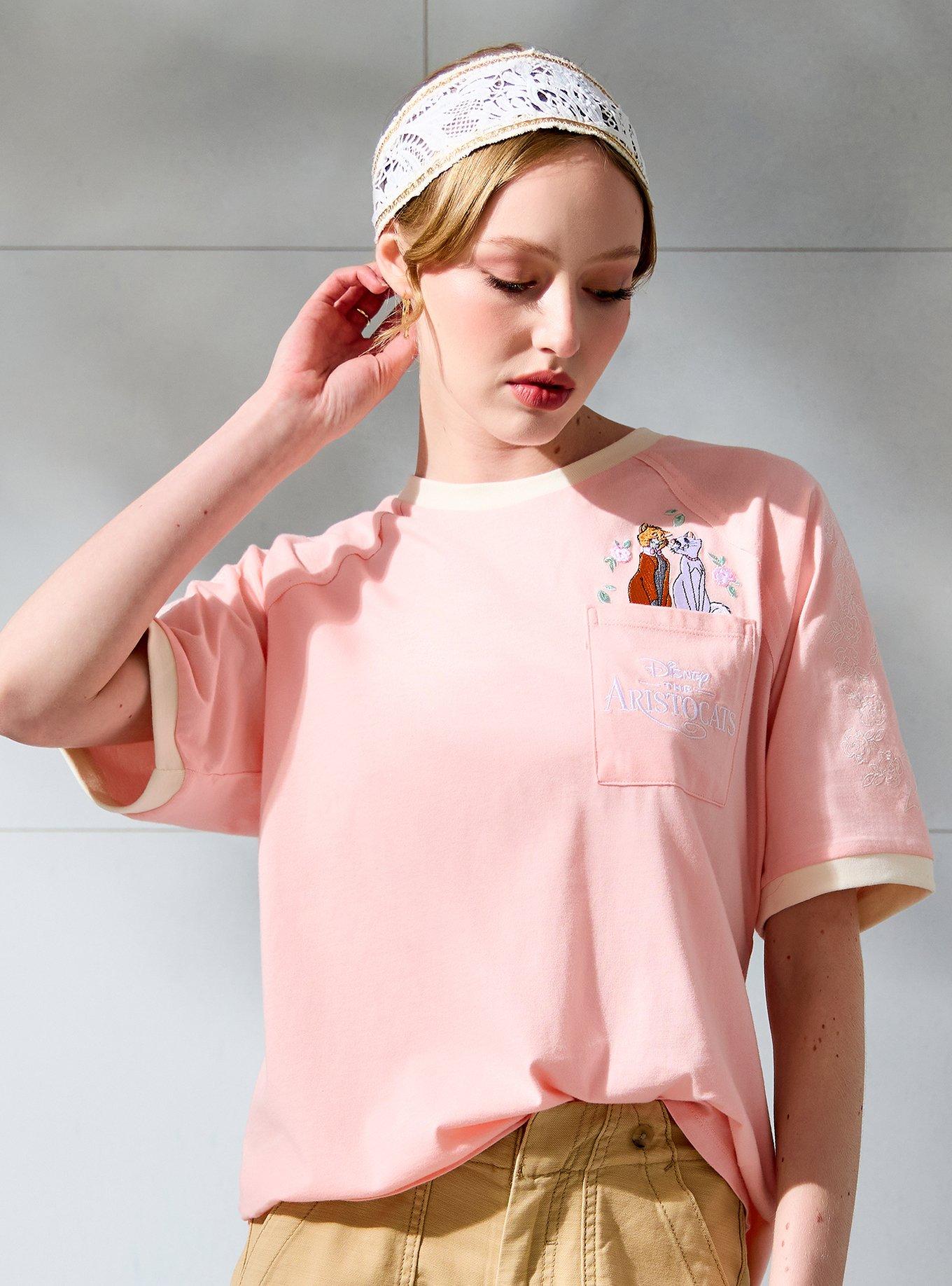 Polera rosada con bolsillo The Aristocats para mujer