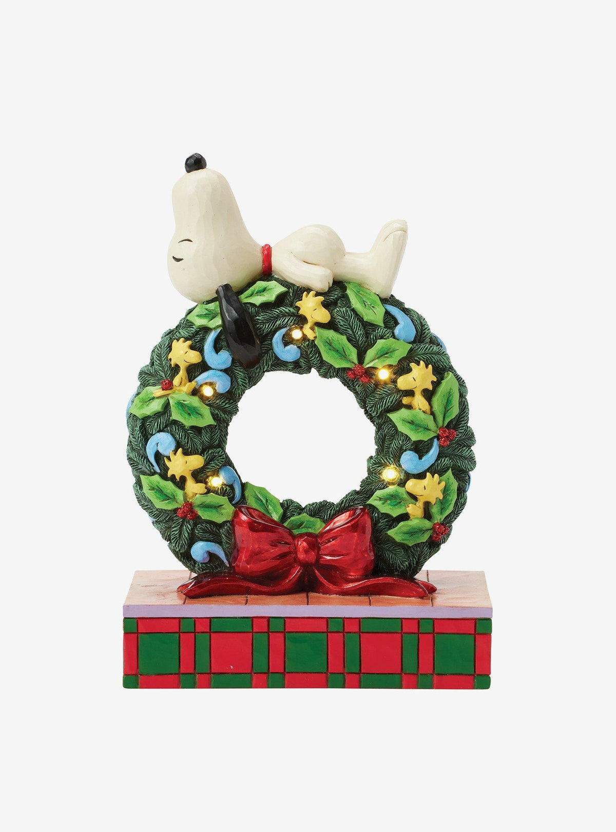 Figura LED de Snoopy durmiendo en corona navideña