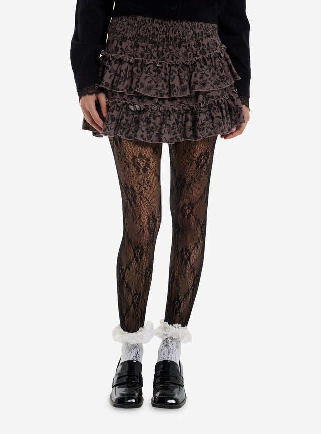 Falda-short en capas de hongos y arañas
