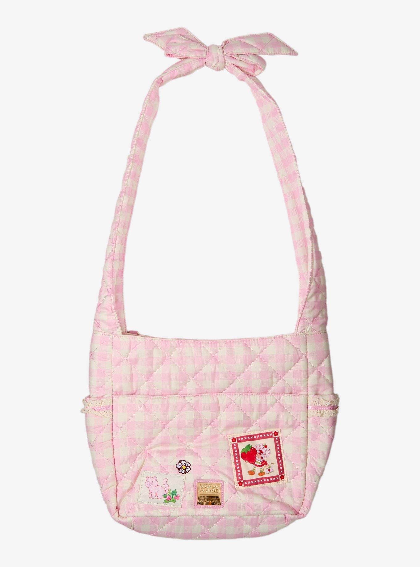 Cartera bandolera rosada de cuadros de Strawberry Shortcake