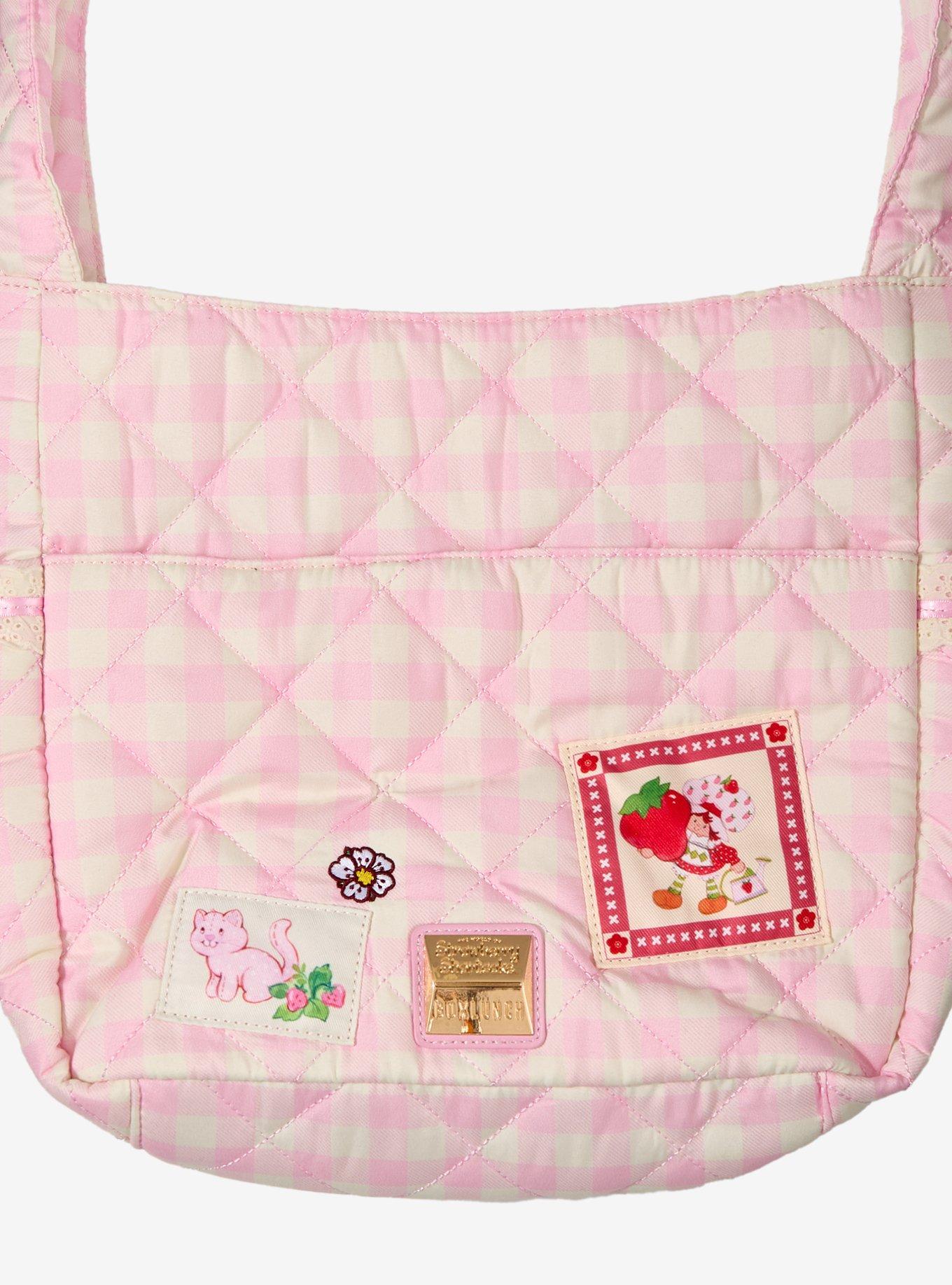 Cartera bandolera rosada de cuadros de Strawberry Shortcake