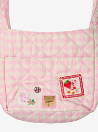 Cartera bandolera rosada de cuadros de Strawberry Shortcake