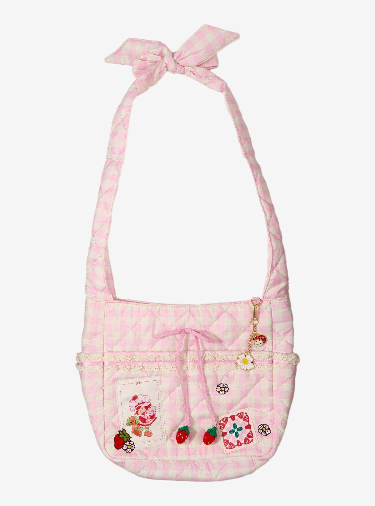 Cartera bandolera rosada de cuadros de Strawberry Shortcake