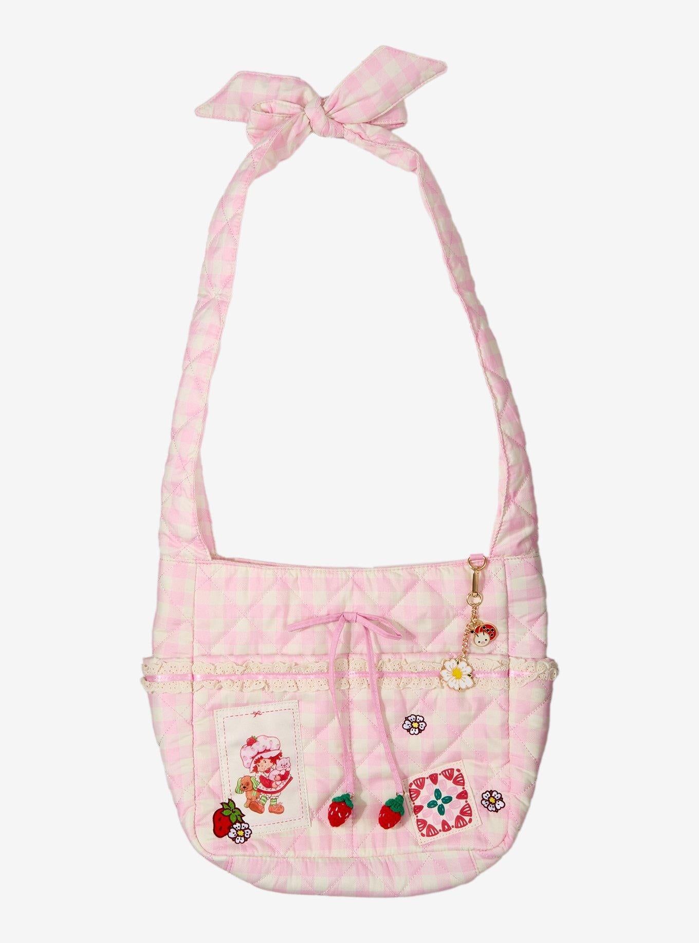 Cartera bandolera rosada de cuadros de Strawberry Shortcake