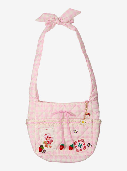 Cartera bandolera rosada de cuadros de Strawberry Shortcake