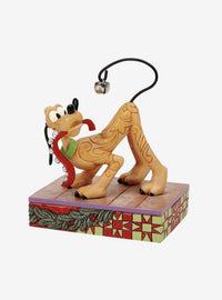 Figura navideña de Pluto con campanas