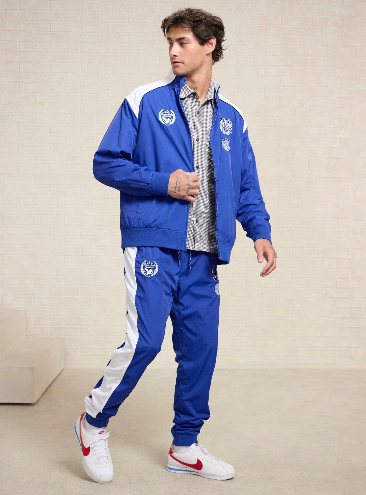 Jogger deportivo con insignias de Hércules Disney