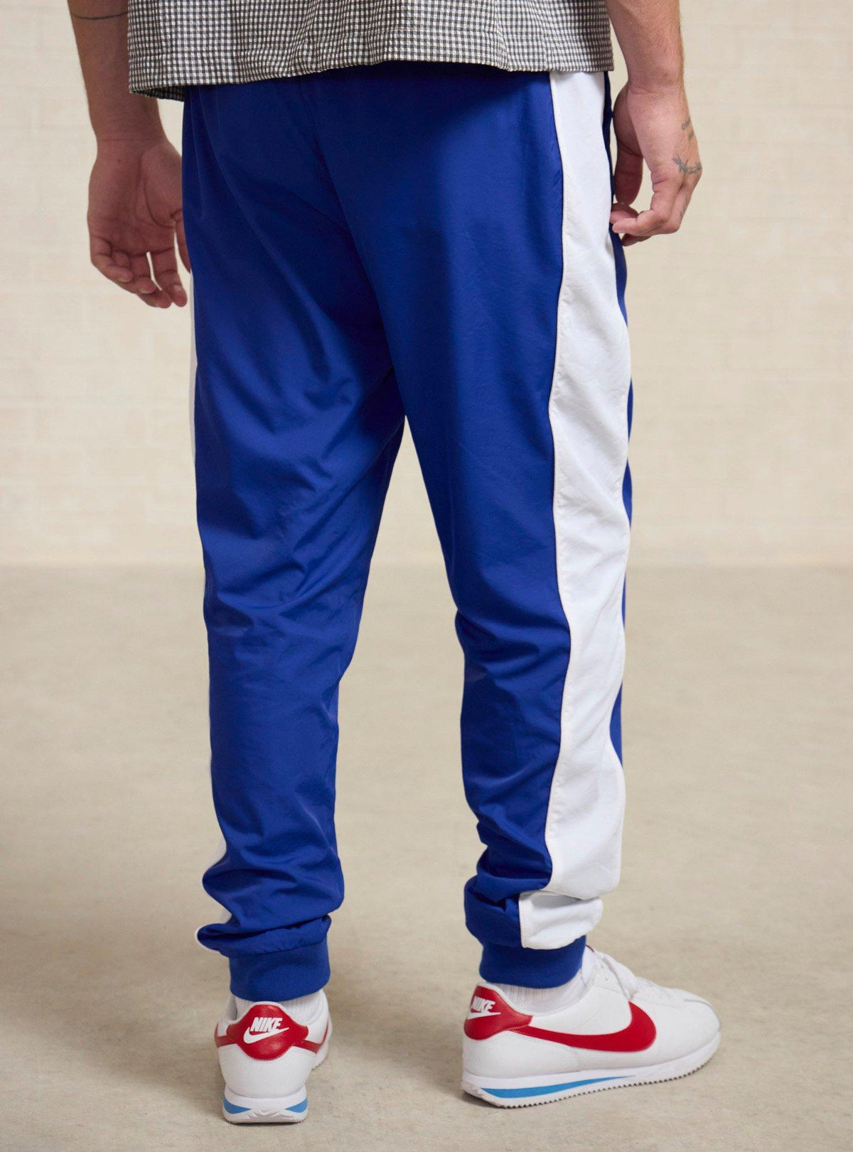 Jogger deportivo con insignias de Hércules Disney