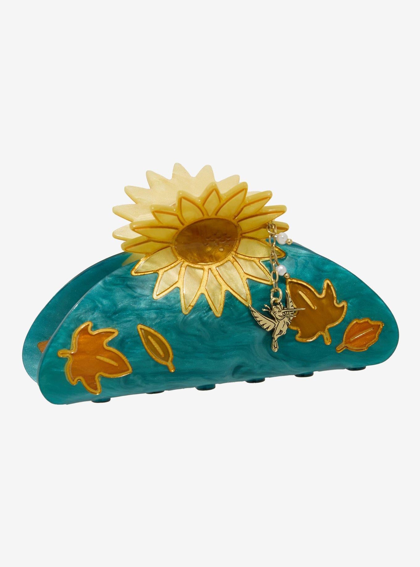 Pinza de pelo Pocahontas con girasol y dije