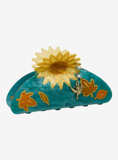 Pinza de pelo Pocahontas con girasol y dije