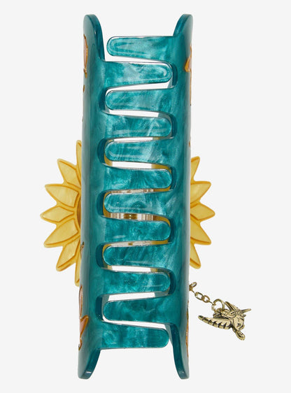 Pinza de pelo Pocahontas con girasol y dije