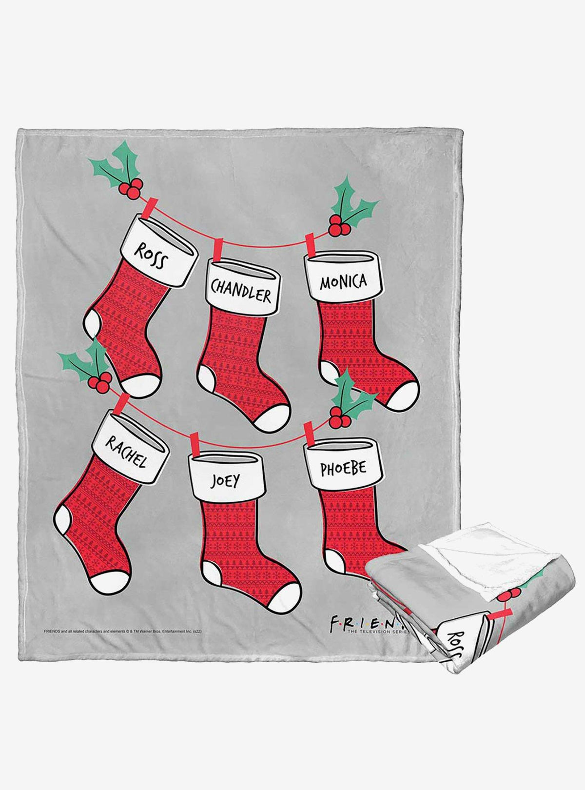 Manta Friends con diseño de medias navideñas