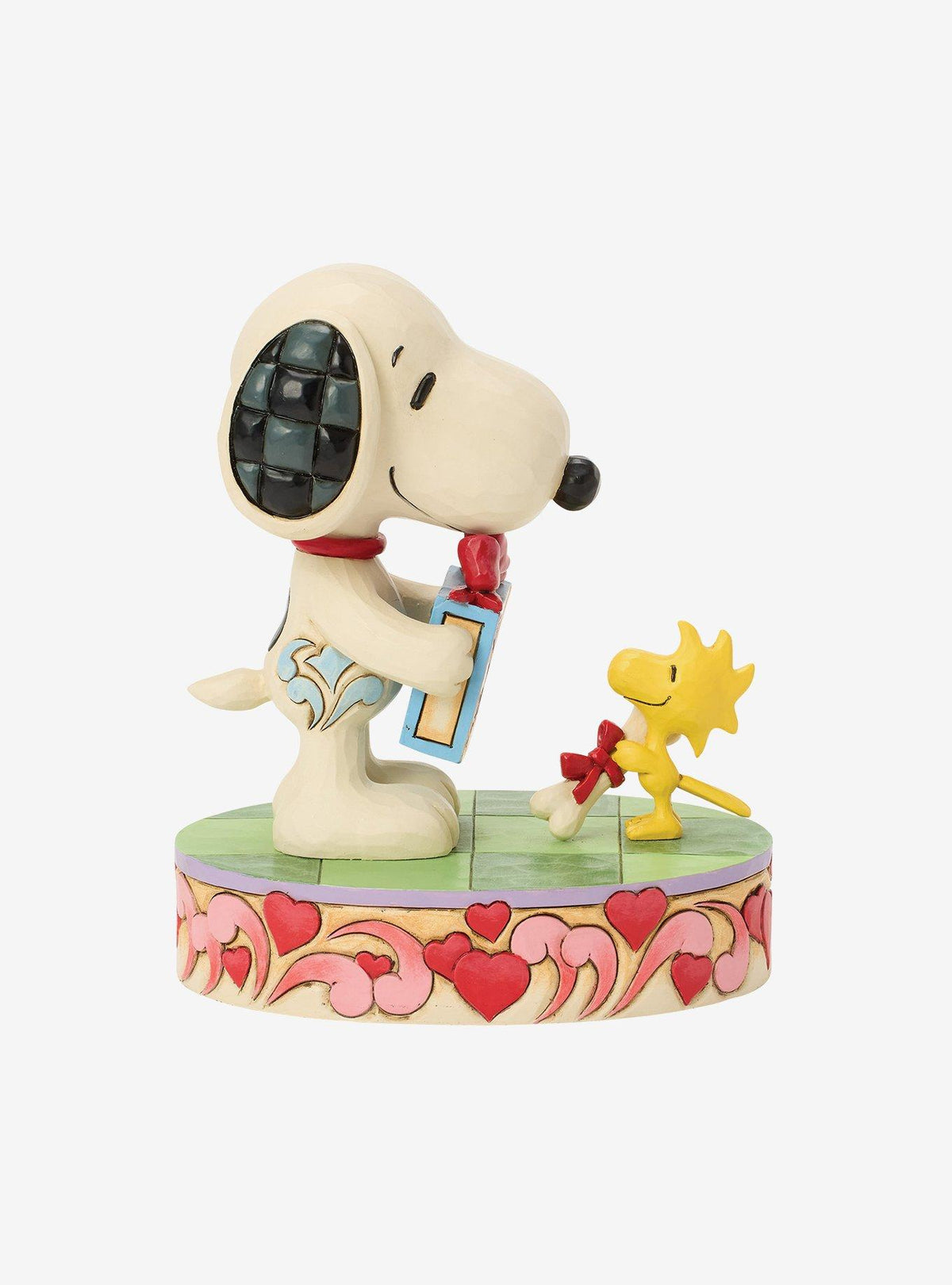 Figura Jim Shore de Snoopy y Woodstock con regalos