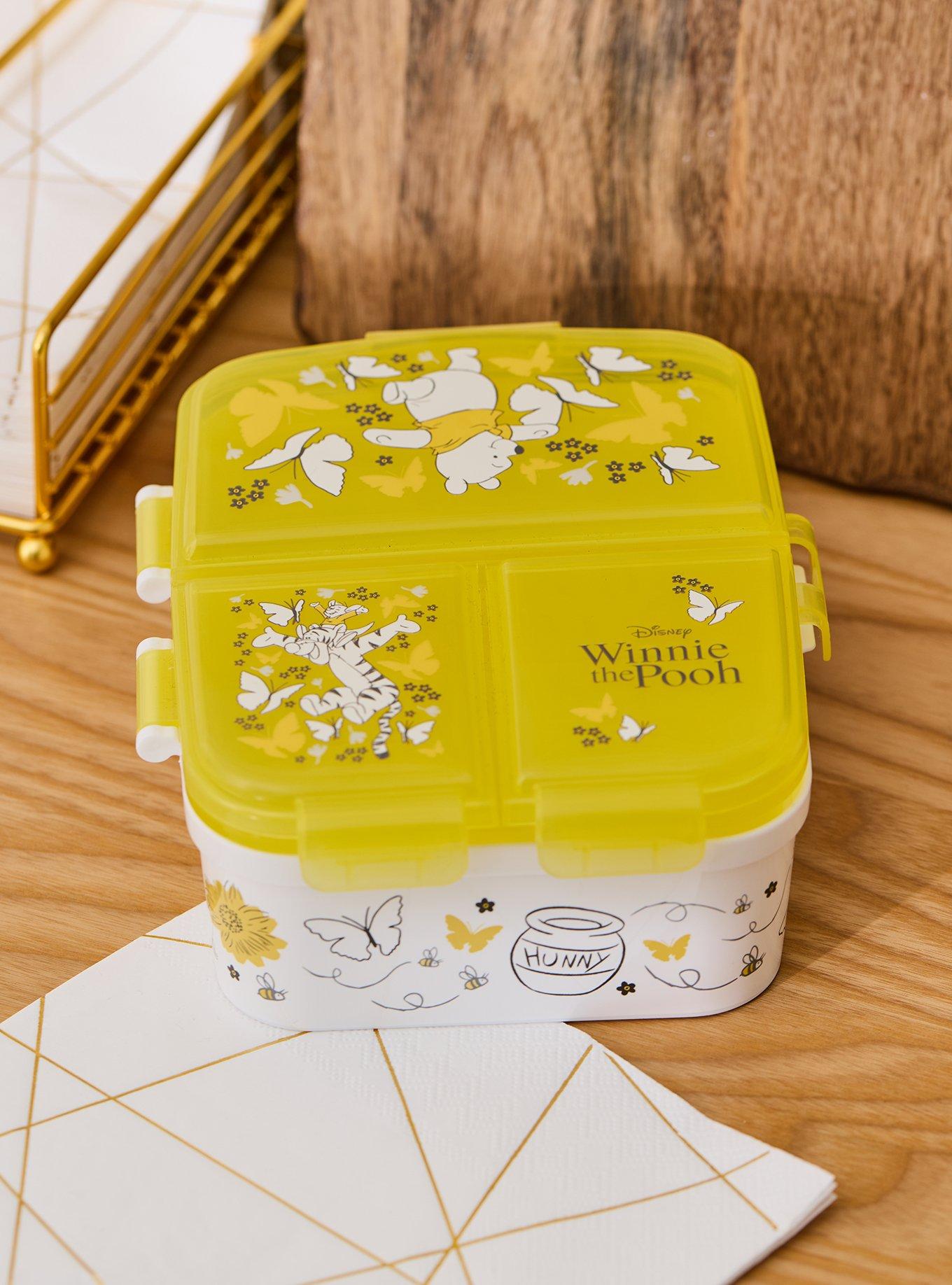 Lonchera Winnie the Pooh con flores