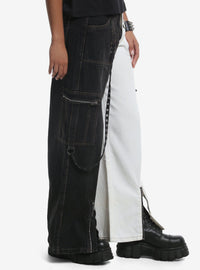Jeans bicolor con diseño dividido y tiras con ojales