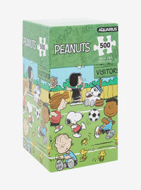 Puzzle Peanuts: Snoopy y sus amigos jugando fútbol