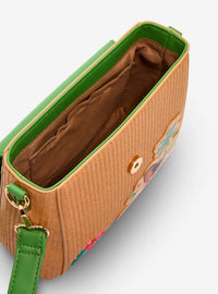 Bolso bandolera de Moana con hojas y dije